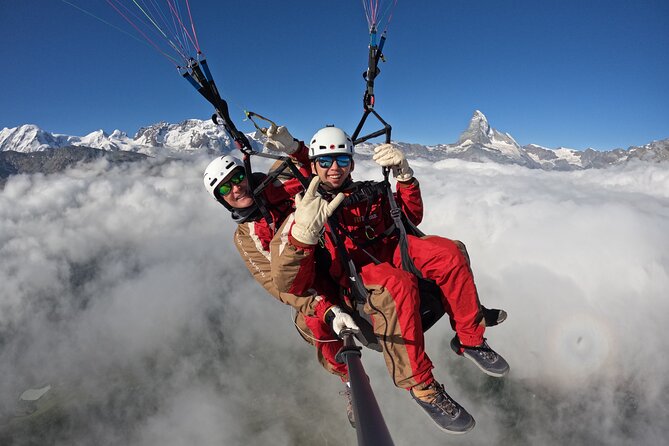 20 to 25 Minute Tandem Paragliding in Zermatt and Matterhorn View - Landing near town and the victory drink