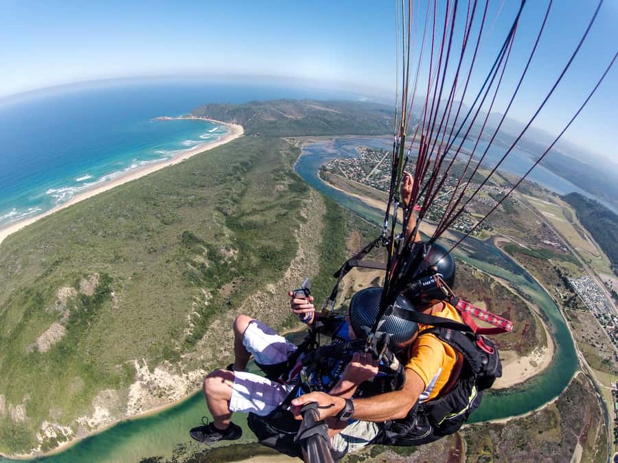 Adventure Tandem Paragliding Flight - Getting ready with a tandem-rated pilot