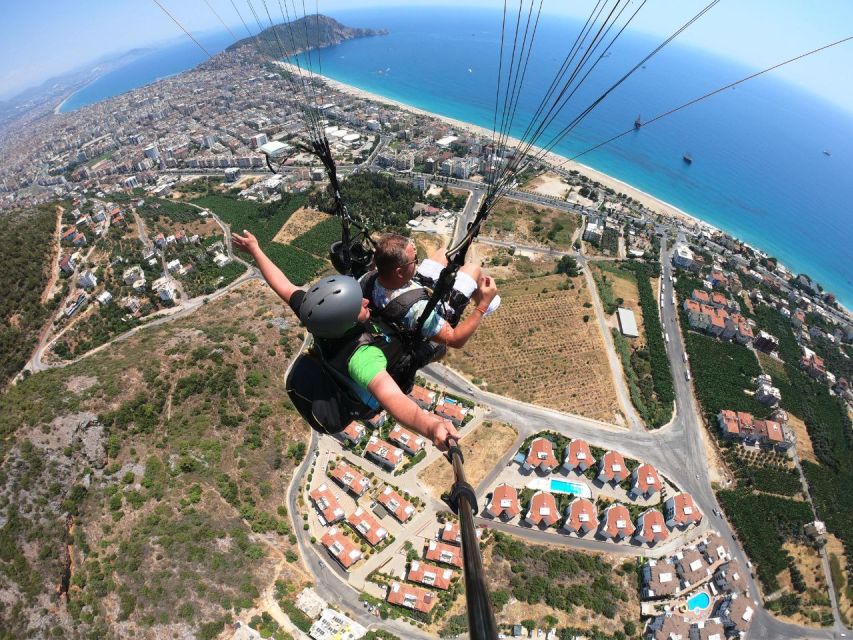 Alanya: Tandem Paragliding from 700m with Meeting or Pick Up - The phone rule and photo package