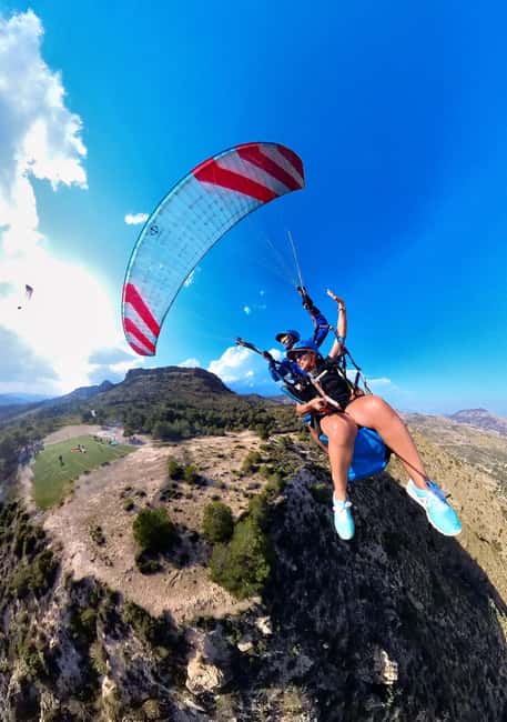 Alicante: Santa Pola, Benidorm Tandem Paragliding Experience - Taking off above Alicante’s mountains