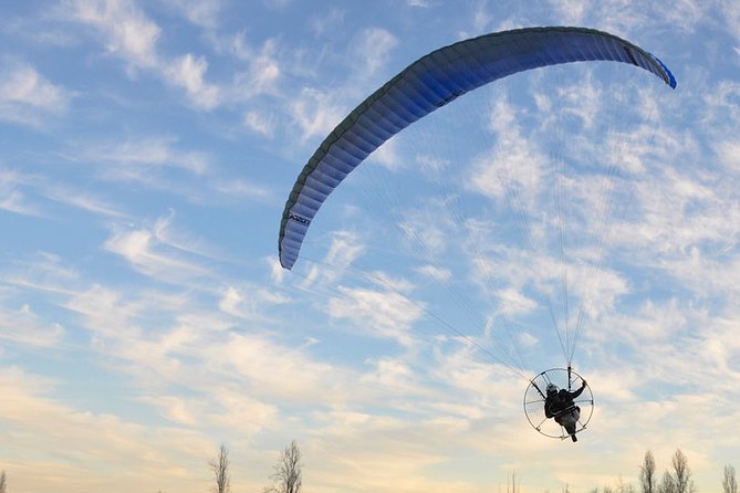 Experience Excitement With Paramator or paragliding. - Flying with a trained professional