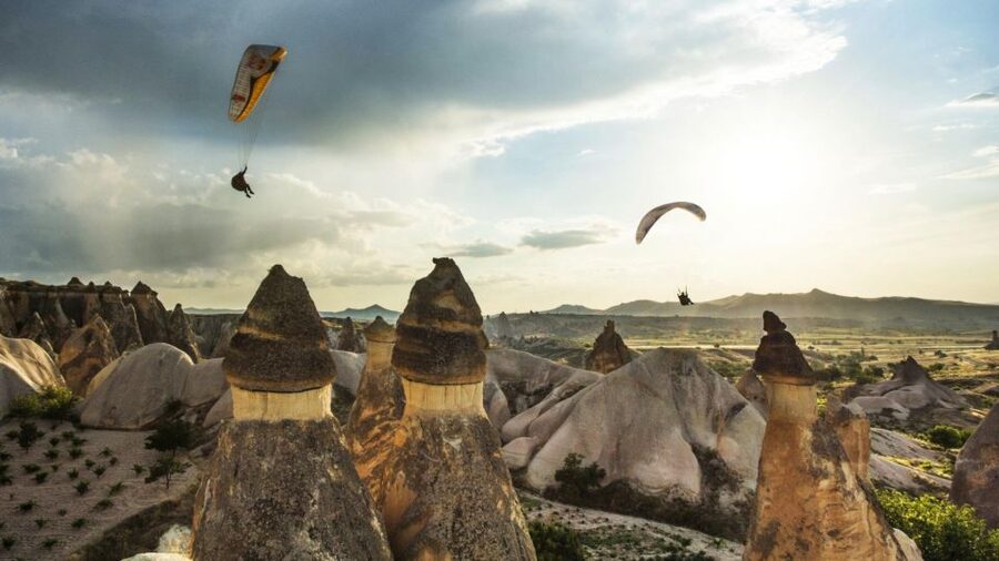 From Urgüp/Göreme: Cappadocia Tandem Paragliding & Transfer - Taking off above Cappadocia’s valleys