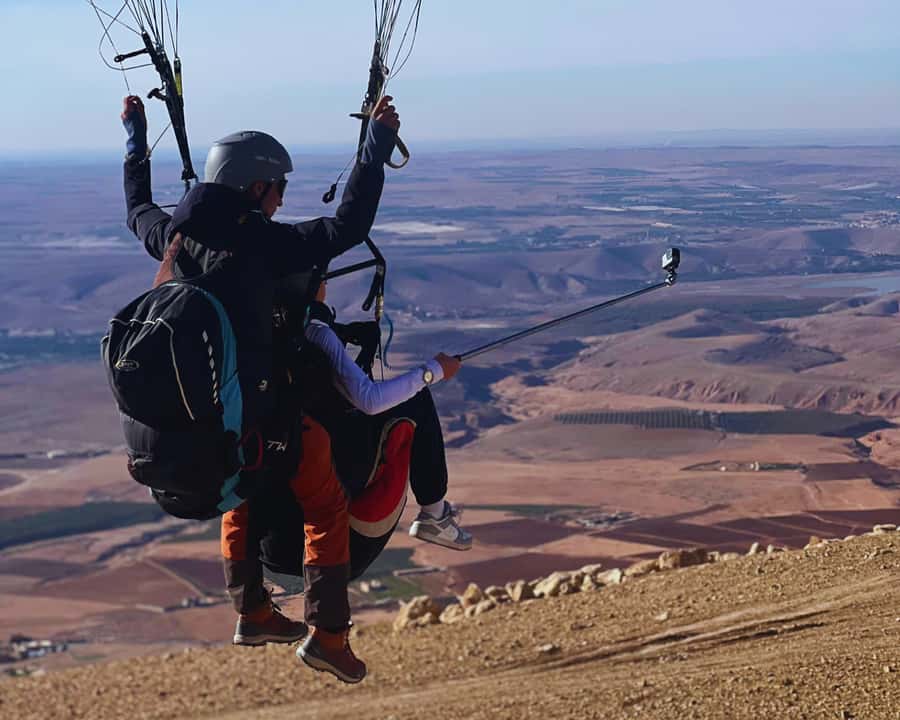 Marrakech: Atlas Mountains Paragliding Tour with Video - Reaching the Atlas foothills and Lalla Takerkoust