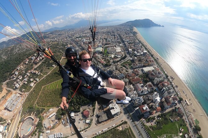 Paragliding Alanya Antalya Turkey - Landing near the beach and returning to the meeting point