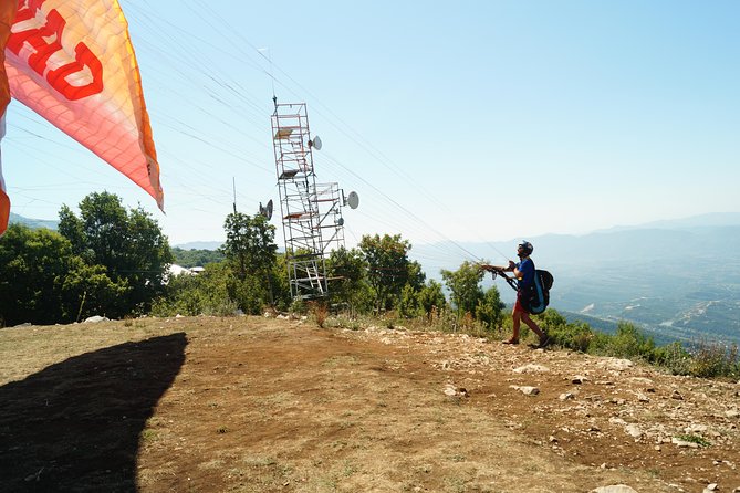 Paragliding Tandem Experience From Dajti Mountain - Landing, taxi return, and the real timing