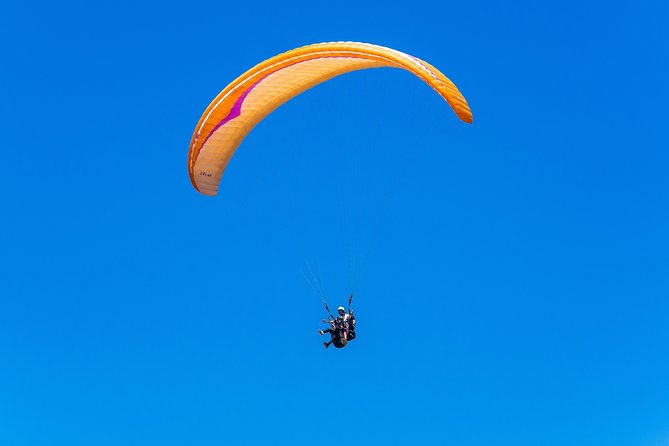 Paragliding tandem flight 1.500 ft & up - Three beaches from one high viewpoint