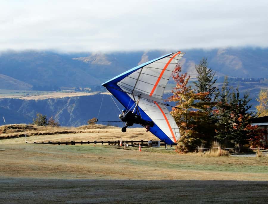 Queenstown: Tandem Hang Gliding Experience - Taking off from Coronet Peak above Queenstown
