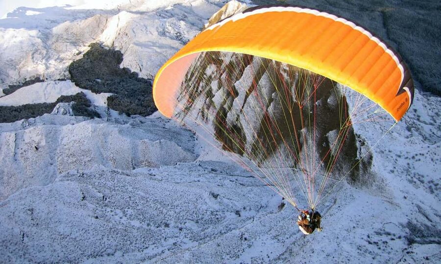 Queenstown: Tandem Paraglide - Winter - Coronet Peak 5400ft - Riding the chairlift to 5,400 feet