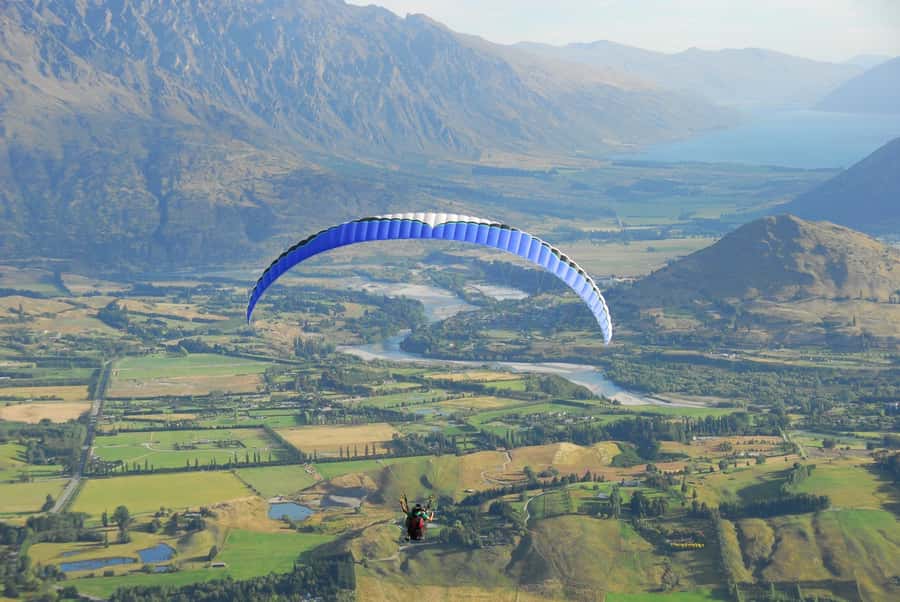 Queenstown: Tandem Paragliding Experience - Leaving Queenstown for Coronet Peak