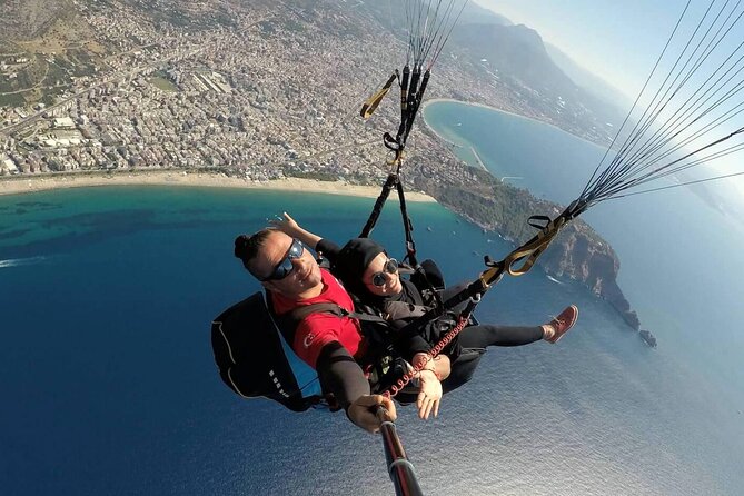 Side Paragliding Experience By Local Expert Pilots - The photo and video decision