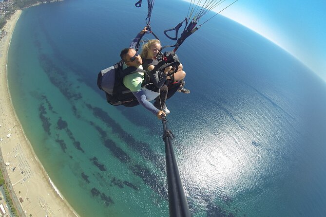 Side Paragliding Experience By Local Expert Pilots - Landing, media, and the ride back