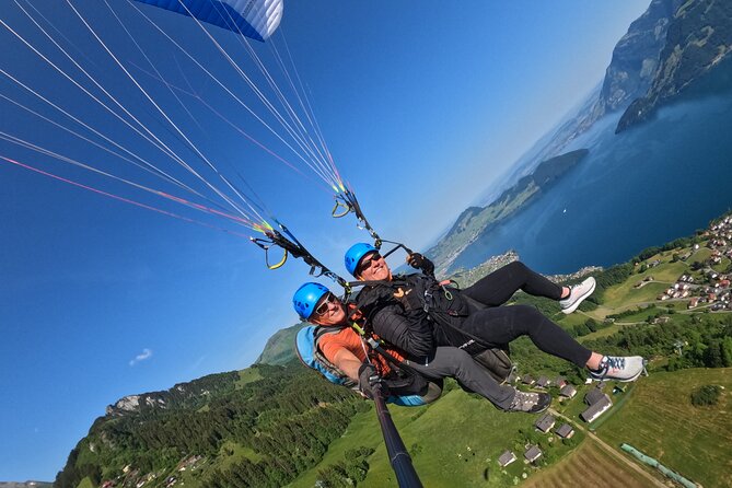 Tandem Paragliding Flight in the Lucerne Region - Landing on a field set aside for paragliders